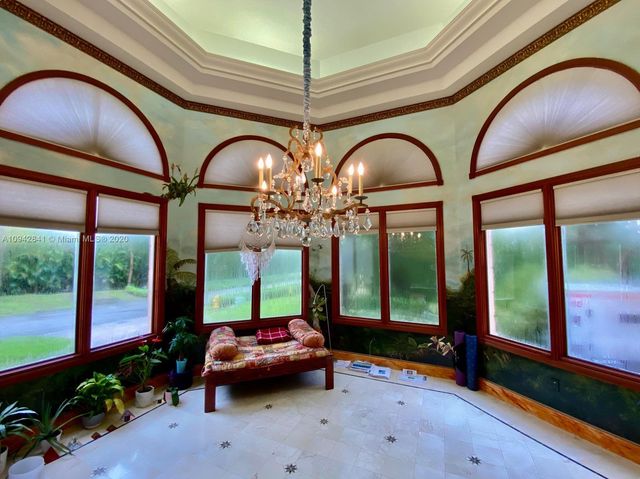 a bathroom with a tub and shower