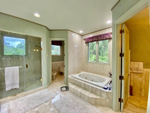 a utility room with sink dryer and washer