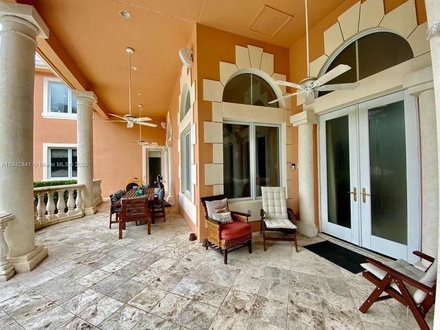 a view of swimming pool with a yard