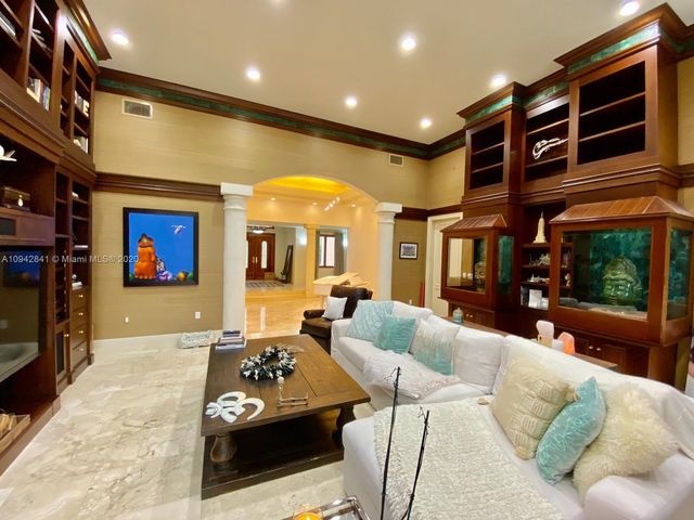 a kitchen with sink cabinets and outdoor view