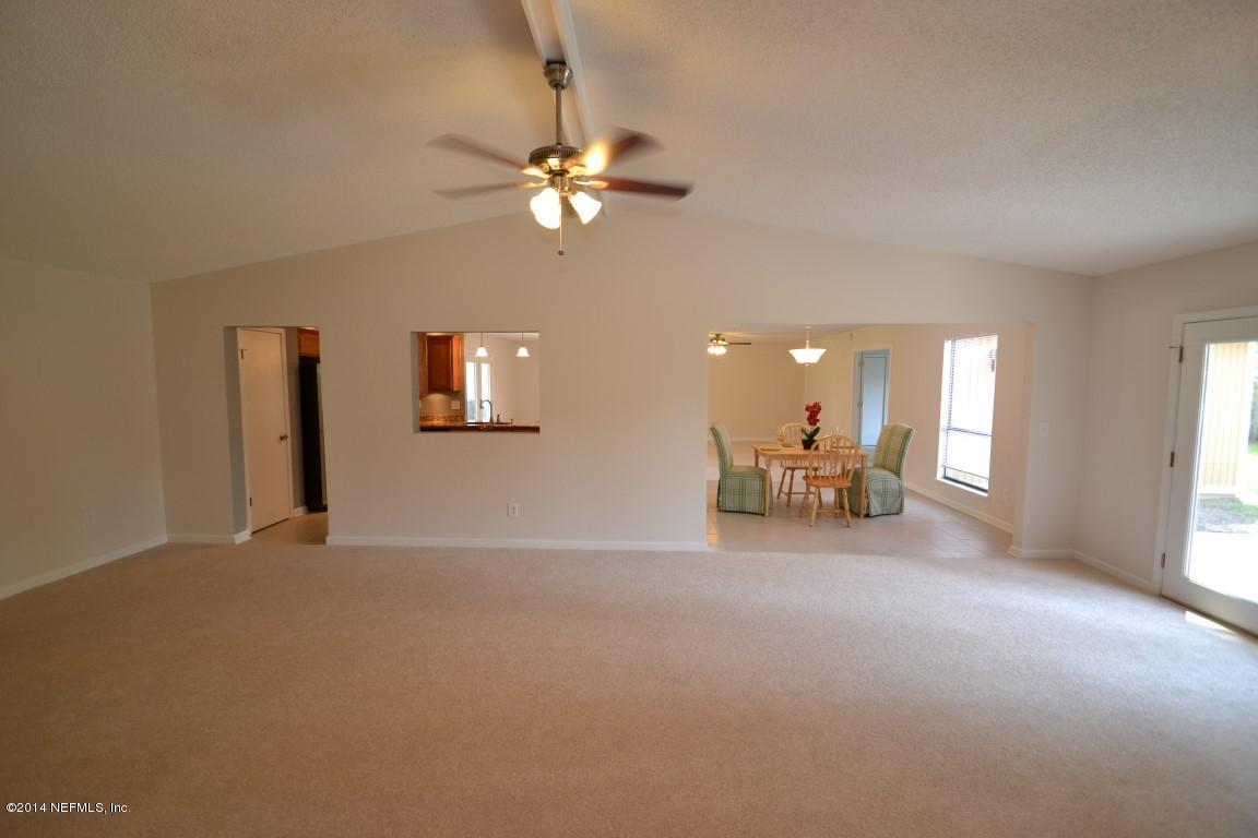10950 Reading Road Jacksonville, FL 32257 - Photo 23 of 42 a view of a livingroom with a large window