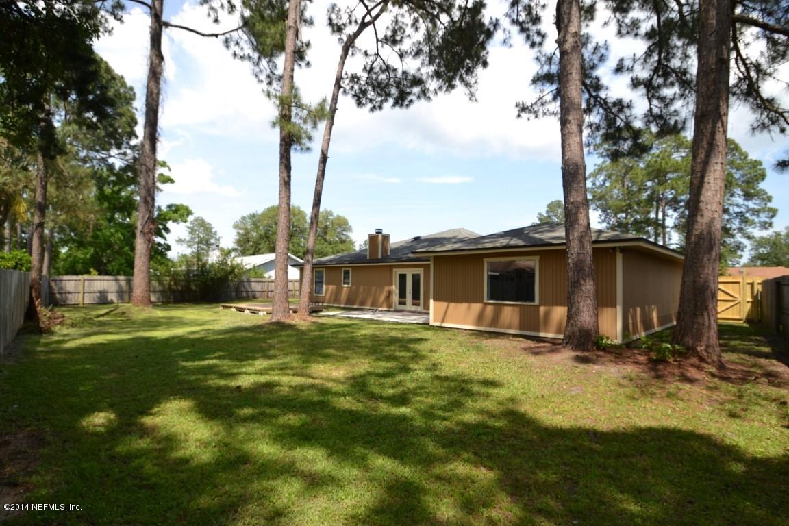 10950 Reading Road Jacksonville, FL 32257 - Photo 36 of 42 a front view of house with yard and trees