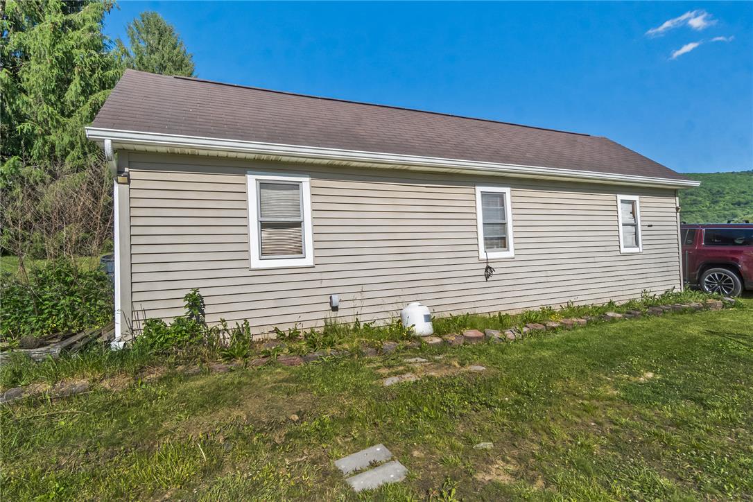 331 East Lizard Creek Road Lehighton, PA 18235 - Photo 11 of 37 Simple siding and a modest roofline create a functional and unassuming exterior.