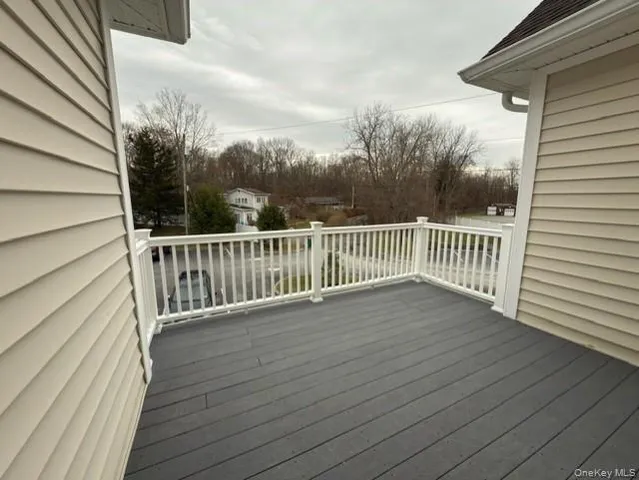 a view of deck and wooden floor