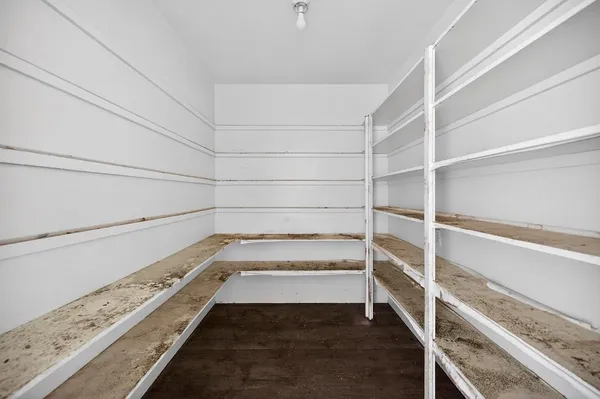 a view of an empty walk in closet