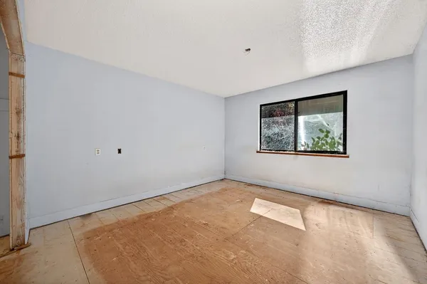 an empty room with a window