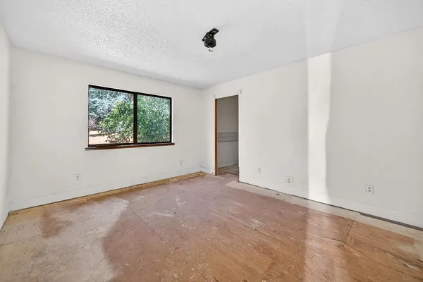 an empty room with windows