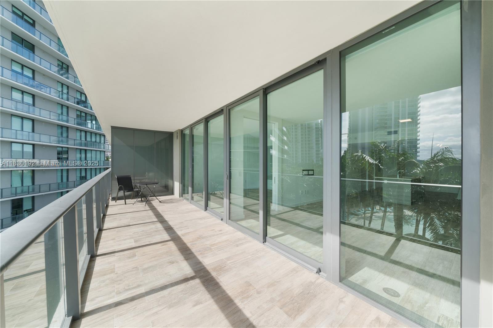 650 Northeast 32nd Street, Unit 802 Miami, FL 33137 - Photo 25 of 33 a view of balcony with a floor to ceiling window