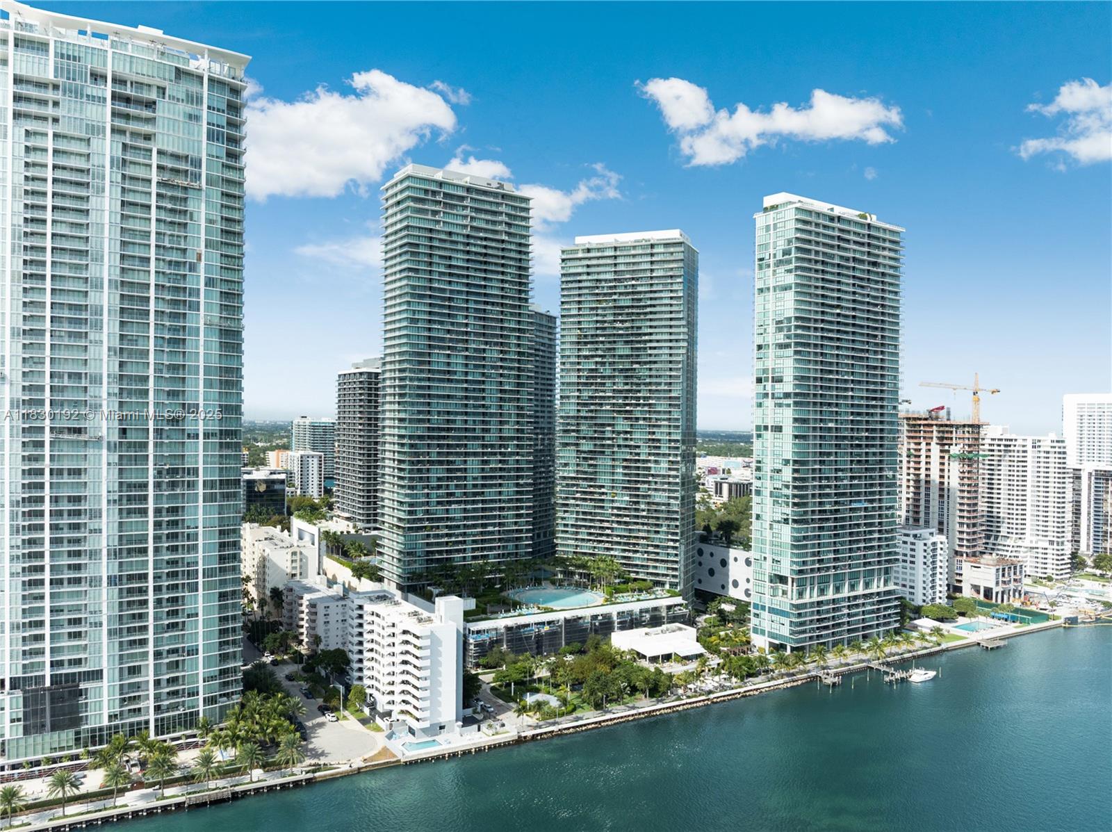 650 Northeast 32nd Street, Unit 802 Miami, FL 33137 - Photo 32 of 33 a front view of a city with tall buildings