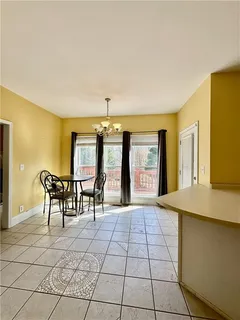 a beautiful room with furniture and large windows