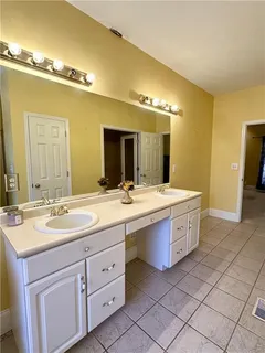 a view of a hallway with a room