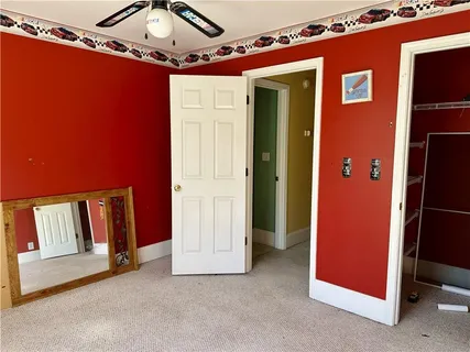 a view of a livingroom with a staircase