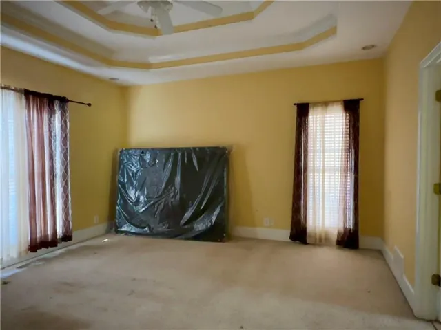 an empty room with windows