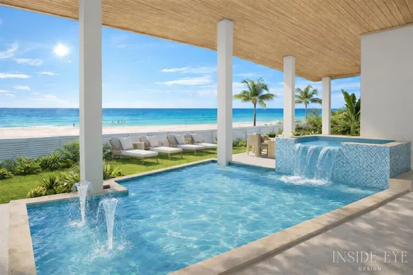 a view of a swimming pool with a patio