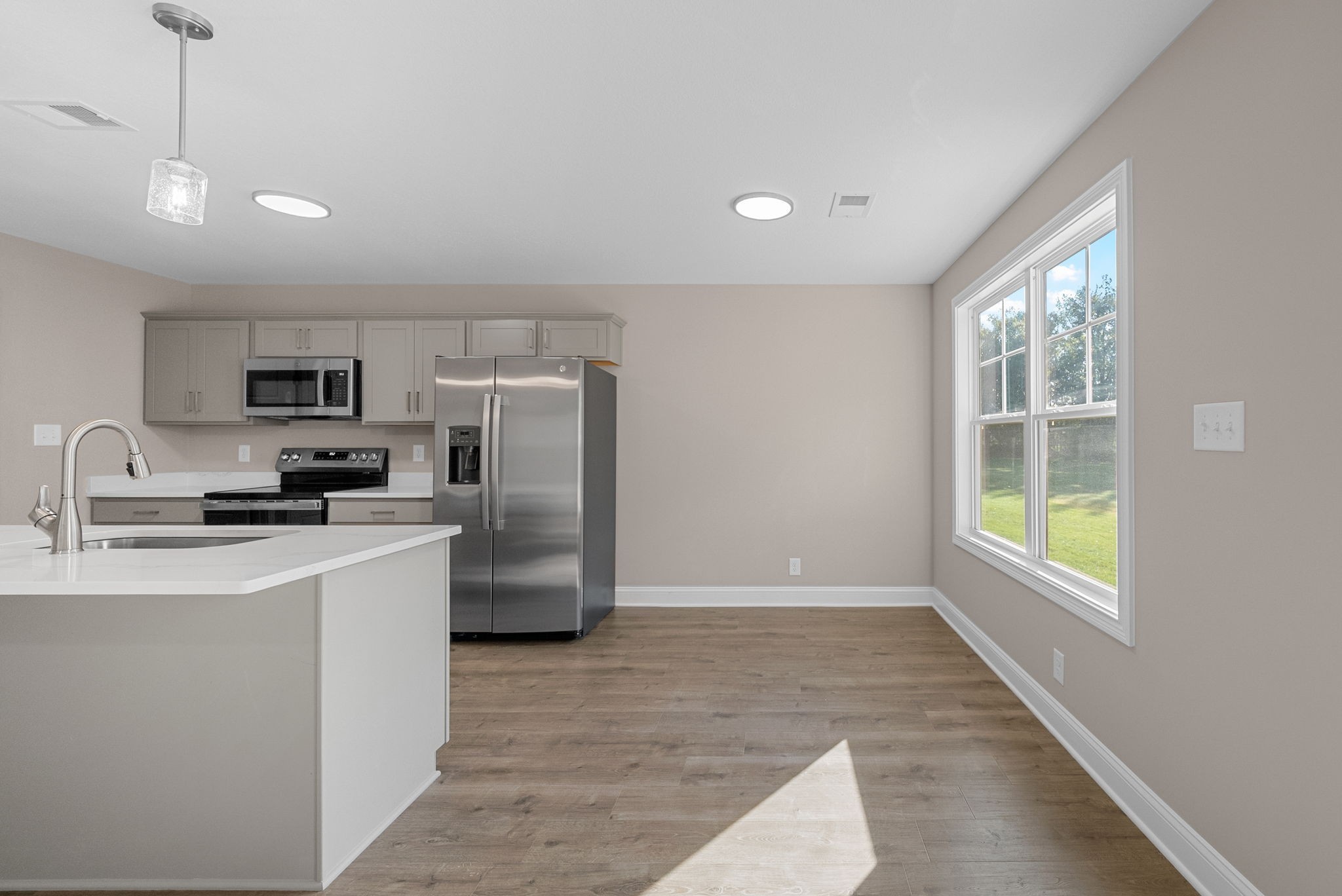 39 Echo Ridge Oak Grove, KY 42262 - Photo 8 of 28 a kitchen with stainless steel appliances granite countertop a refrigerator a sink a stove top oven a counter space and cabinets
