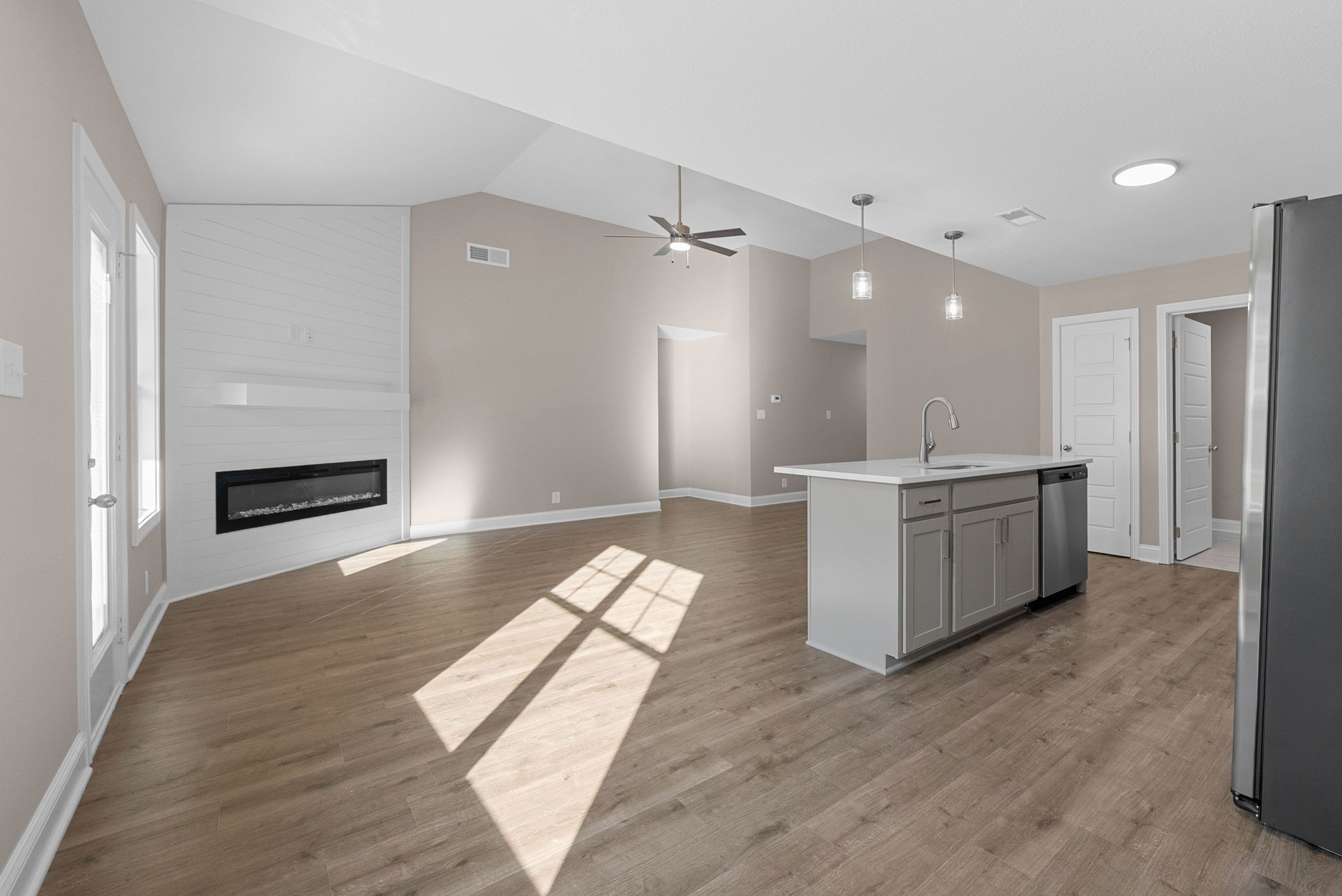 39 Echo Ridge Oak Grove, KY 42262 - Photo 9 of 28 a large white kitchen with a sink stainless steel appliances and cabinets