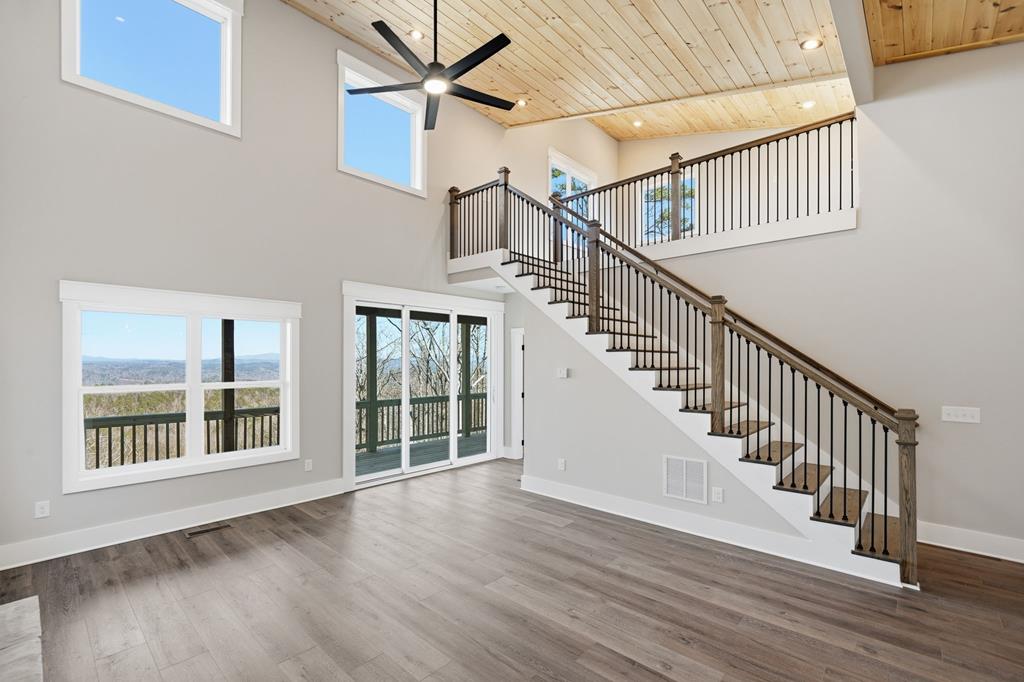 1176 Jewel Court Northeast Ranger, GA 30734 - Photo 14 of 57 a view of an entryway with wooden floor and stairs
