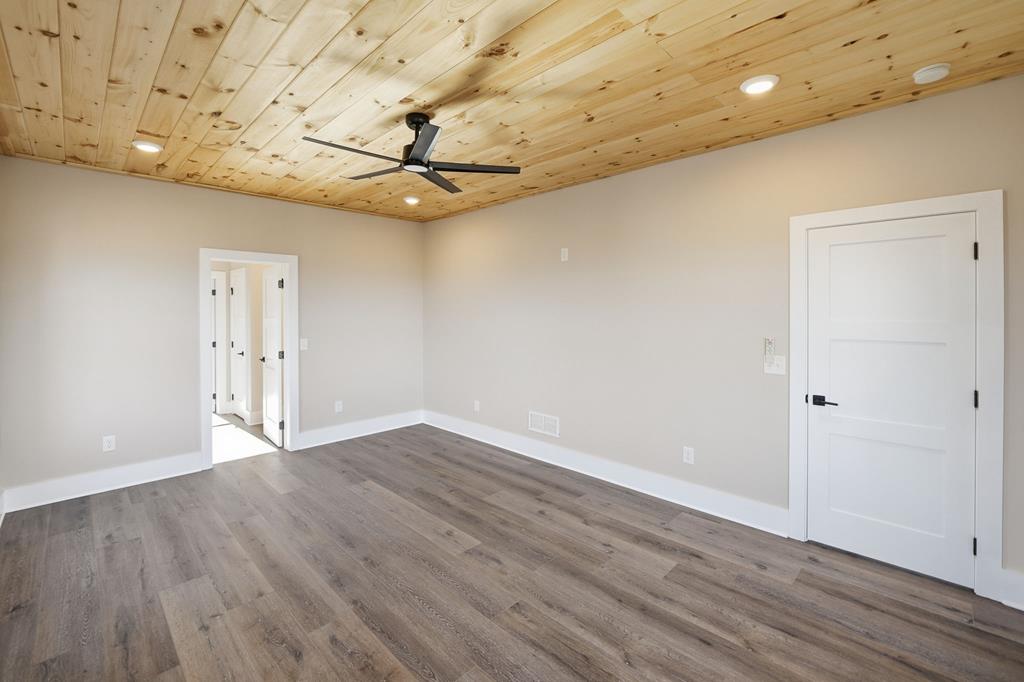 1176 Jewel Court Northeast Ranger, GA 30734 - Photo 22 of 57 wooden floor in an empty room