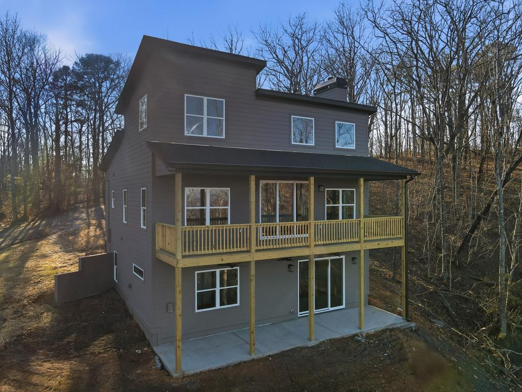 1176 Jewel Court Northeast Ranger, GA 30734 - Photo 46 of 57 a front view of a house with a yard