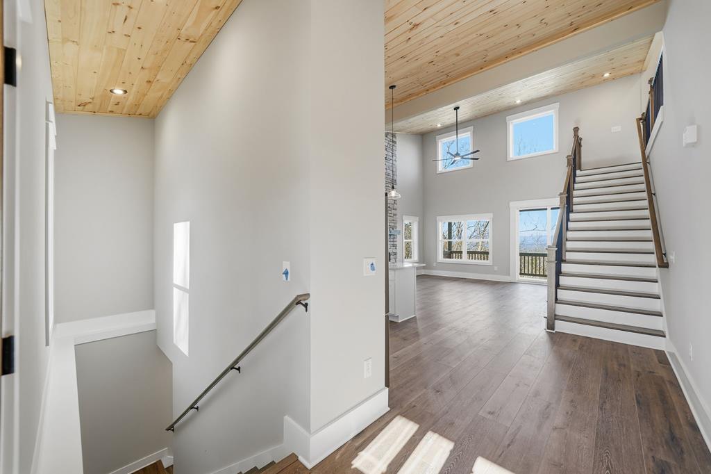 1176 Jewel Court Northeast Ranger, GA 30734 - Photo 9 of 57 a view of a hallway view with wooden floor and staircase