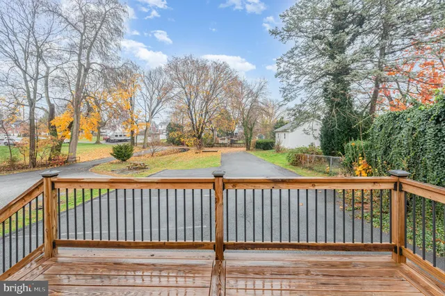 a view of a street with a trees