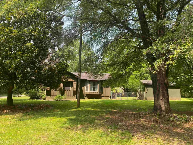 a view of a swimming pool and lounge chair