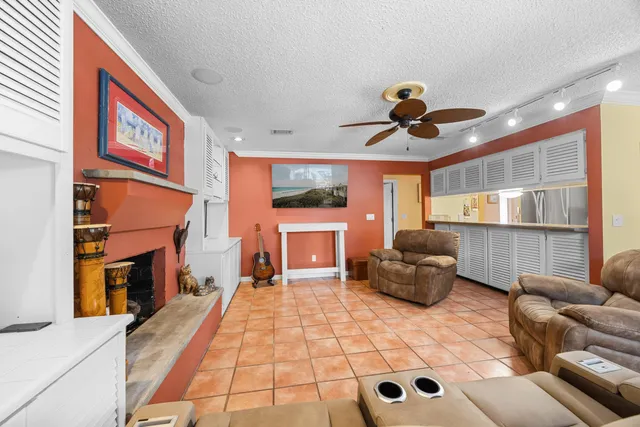 a balcony with table and chairs