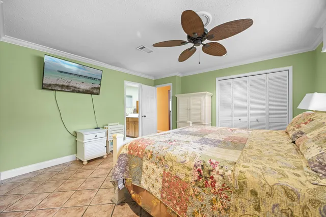 a spacious bathroom with a double vanity sink a mirror and a shower