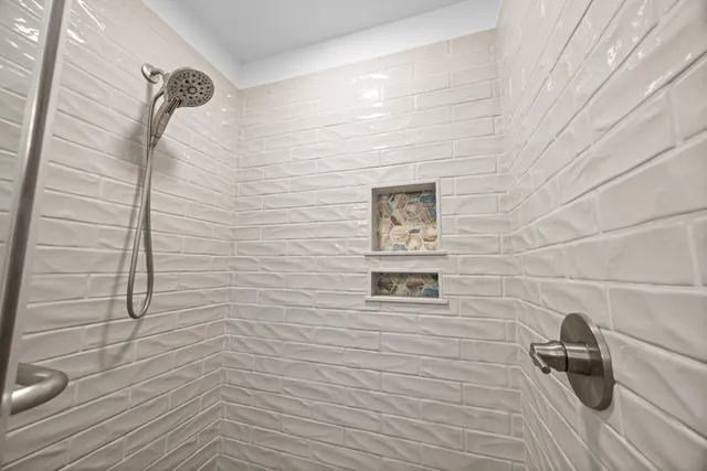 a bedroom with a bed and a table