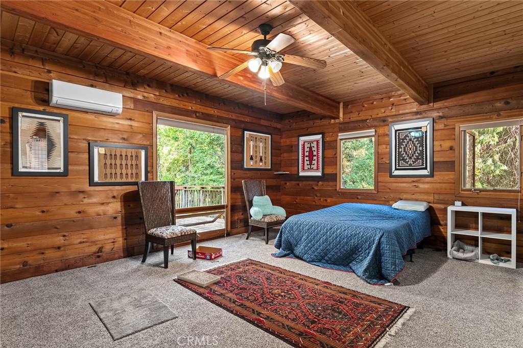 14969 Centerville Road Magalia, CA 95954 - Photo 19 of 75 a bed room with a bed and a chair