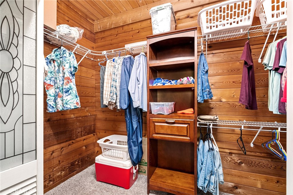 14969 Centerville Road Magalia, CA 95954 - Photo 23 of 75 a view of walk in closet with clothes and shoes