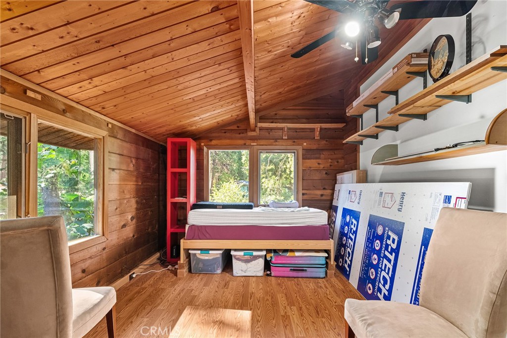 14969 Centerville Road Magalia, CA 95954 - Photo 24 of 75 a room with furniture a large window and a chandelier