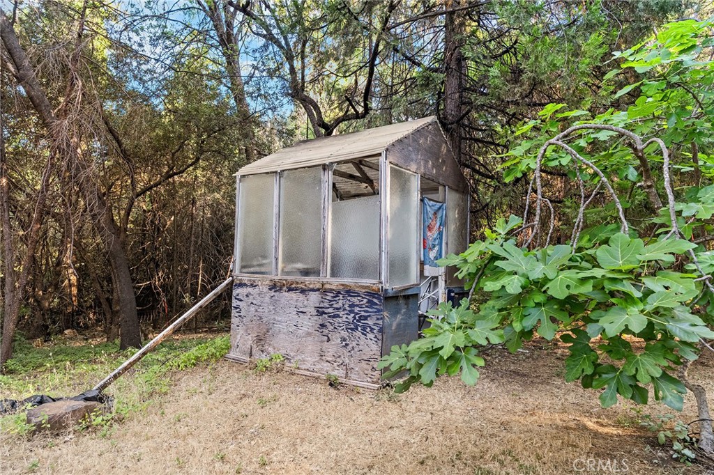 14969 Centerville Road Magalia, CA 95954 - Photo 69 of 75 a view of a house with a tree beside it