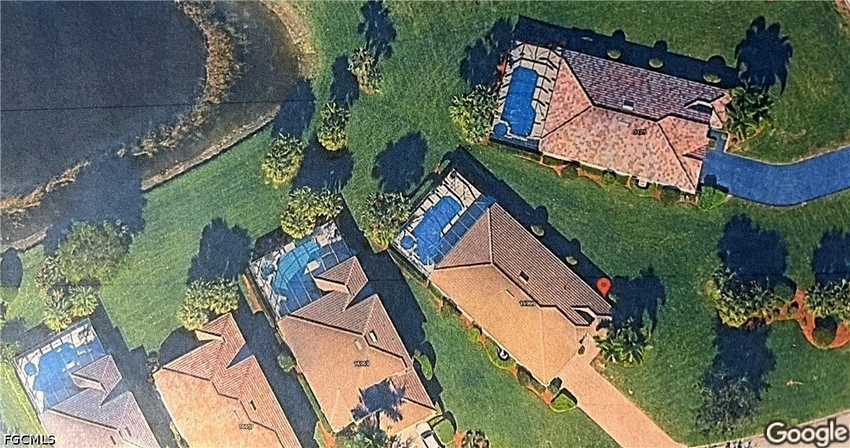 16969 Oakstead Drive Alva, FL 33920 - Photo 2 of 20 an aerial view of a house