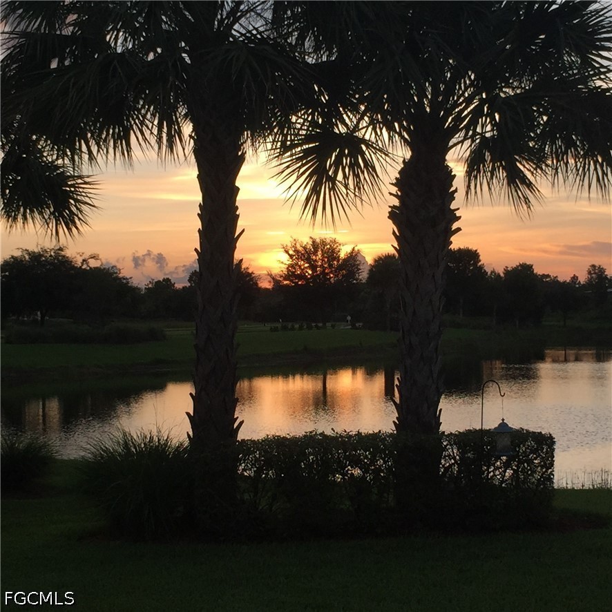 16969 Oakstead Drive Alva, FL 33920 - Photo 4 of 20 a view of lake from yard