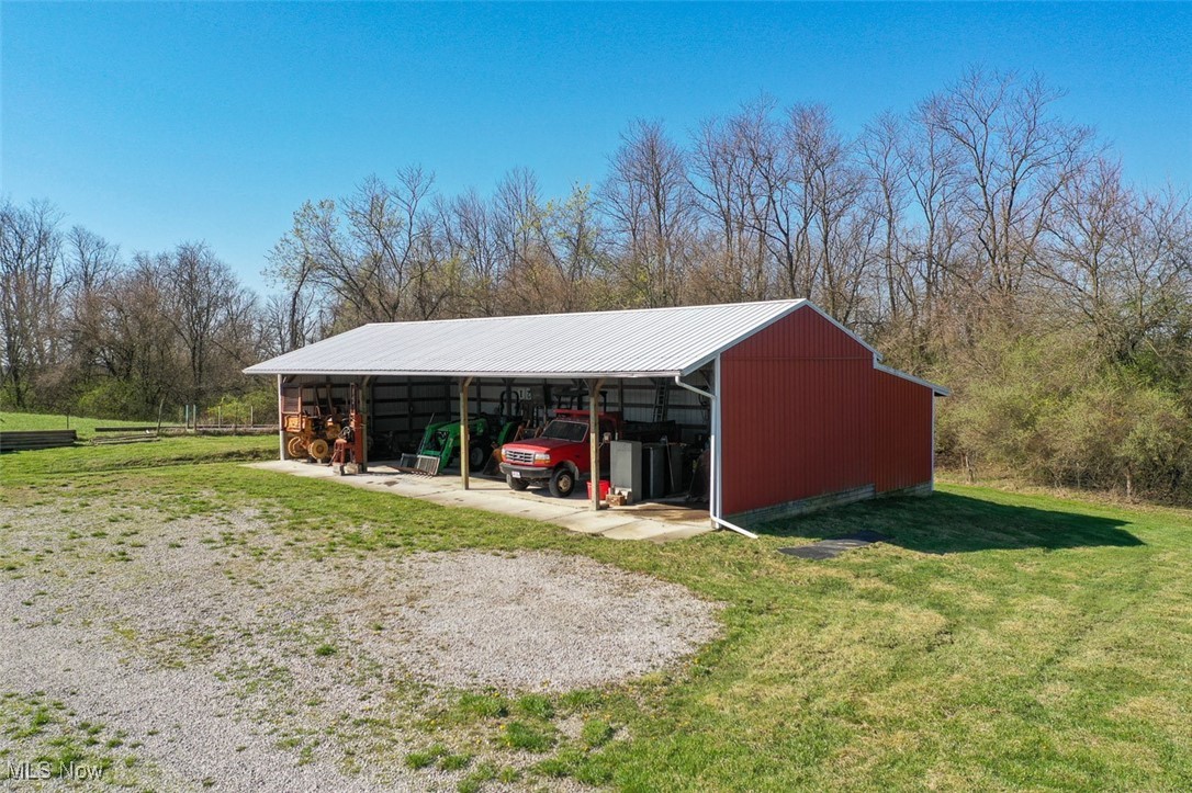 45559 Old Hopedale Road Cadiz, OH 43907 - Photo 5 of 26 View of pole building featuring a yard and a carport
