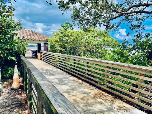 a balcony with wooden floor