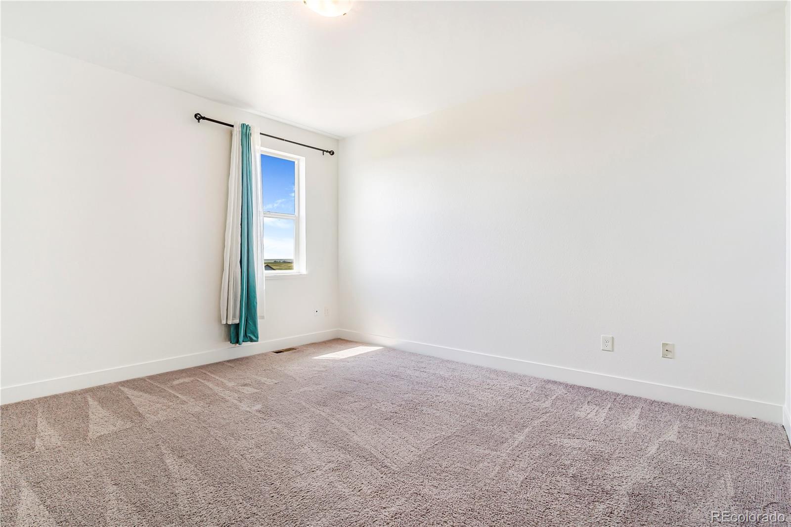 497 Valley Way Bennett, CO 80102 - Photo 19 of 37 a view of an empty room