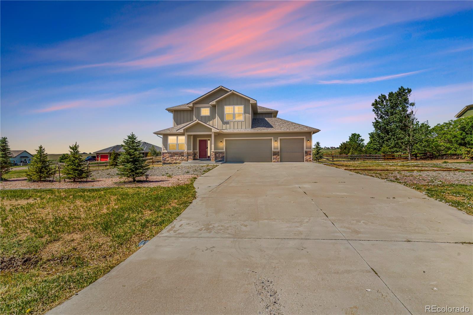 497 Valley Way Bennett, CO 80102 - Photo 36 of 37 a front view of a house with a yard