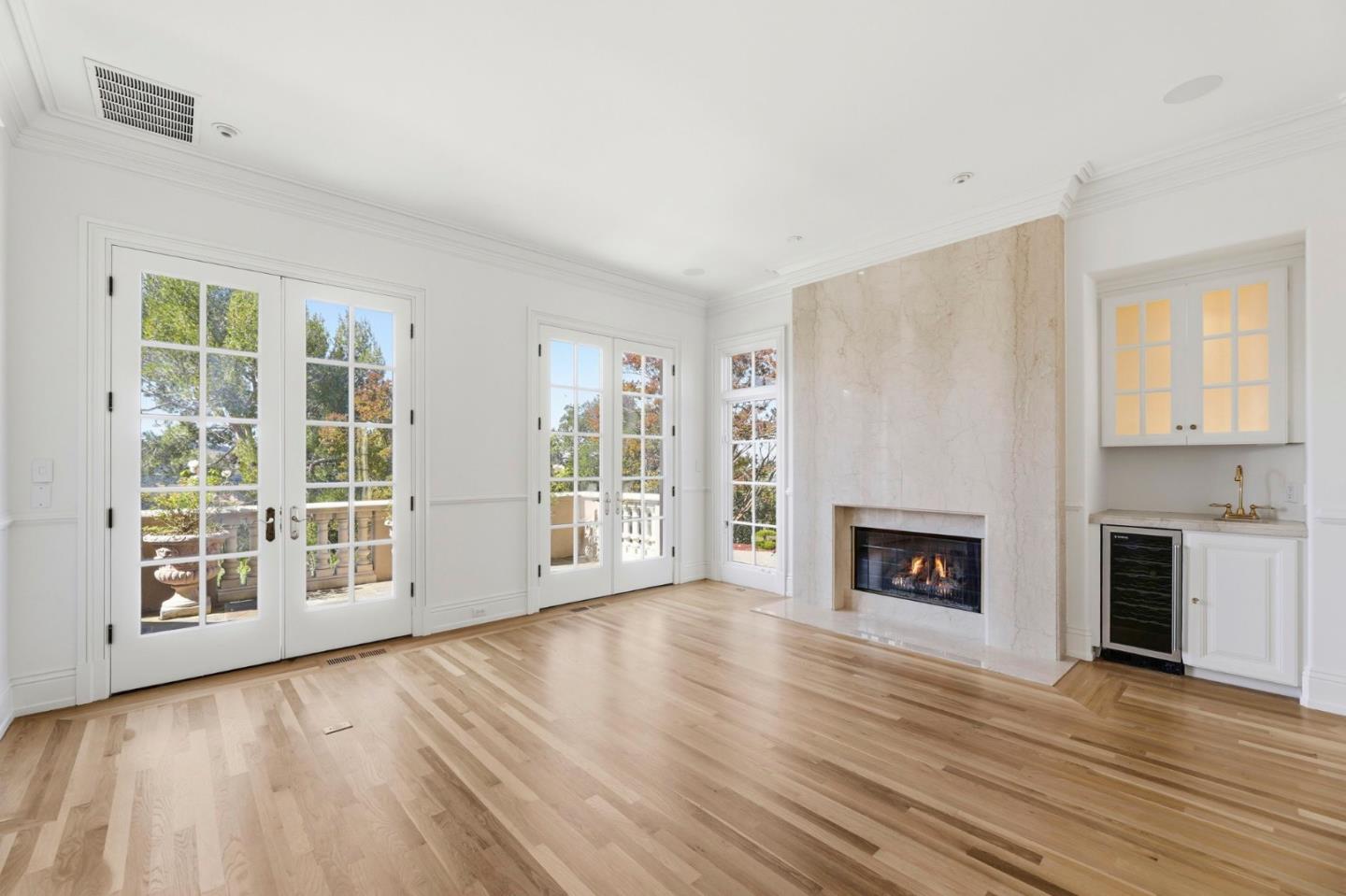 14113 Pike Road Saratoga, CA 95070 - Photo 11 of 78 a view of an empty room with window and fireplace