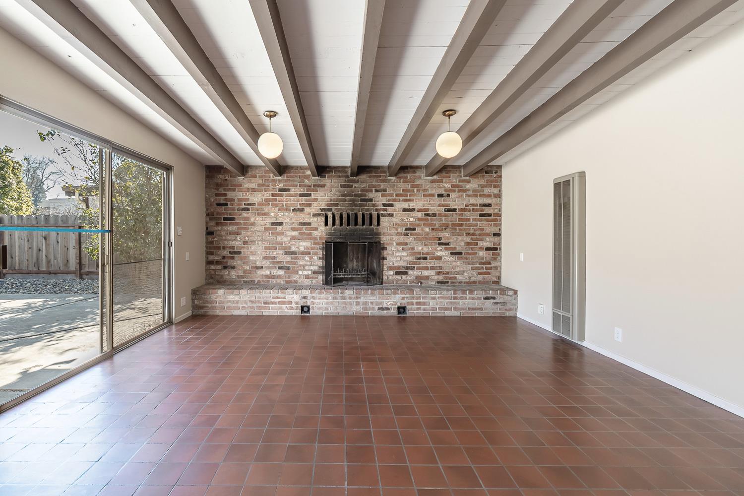 1506 Madison Avenue Tracy, CA 95376 - Photo 11 of 21 a view of empty room with wooden floor