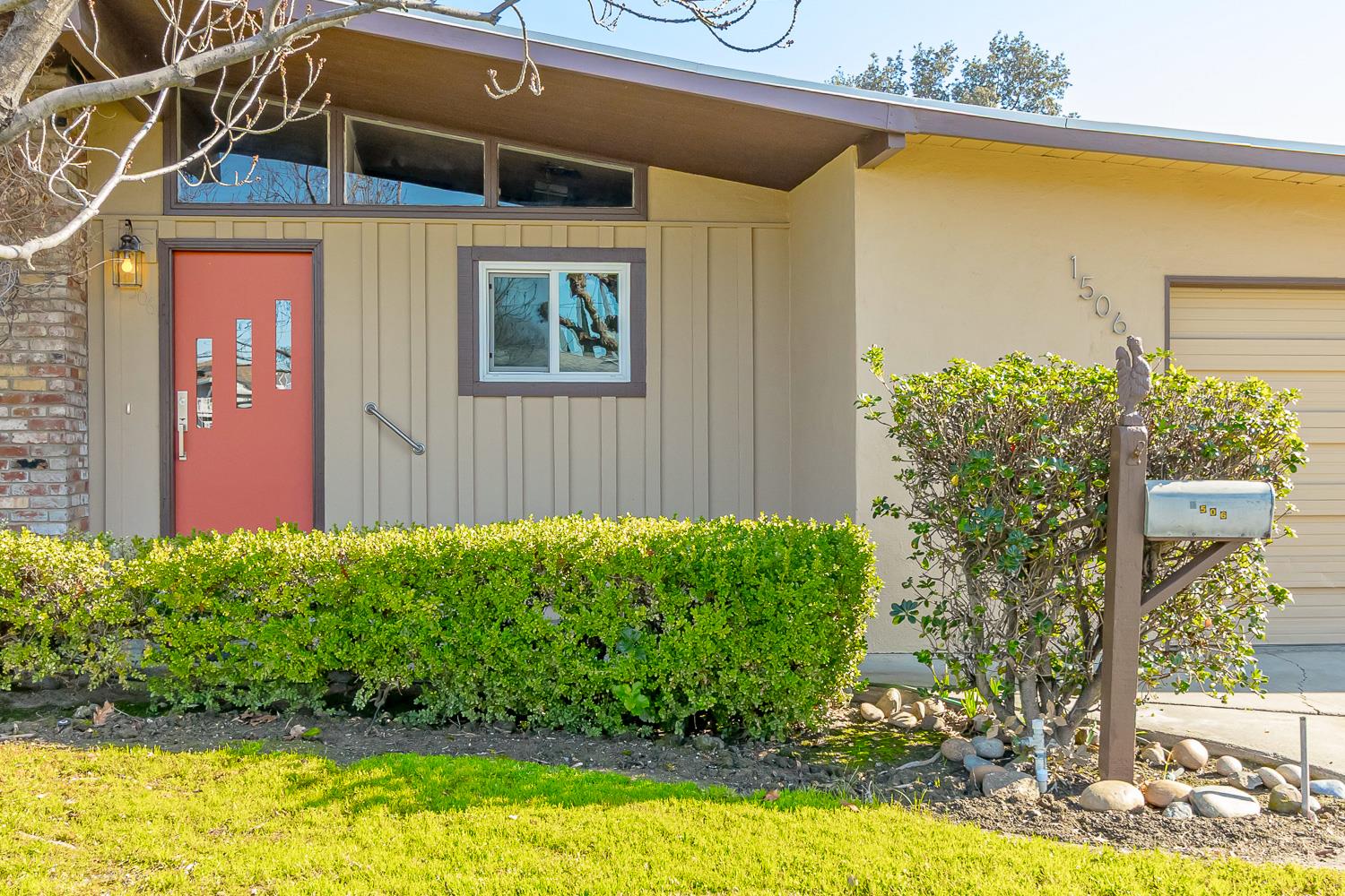 1506 Madison Avenue Tracy, CA 95376 - Photo 2 of 21 a front view of a house with garden