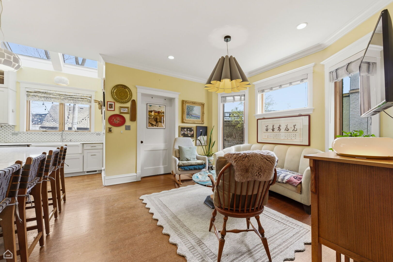 1516 West Sherwin Avenue Chicago, IL 60626 - Photo 15 of 45 a living room with furniture and a wooden floor