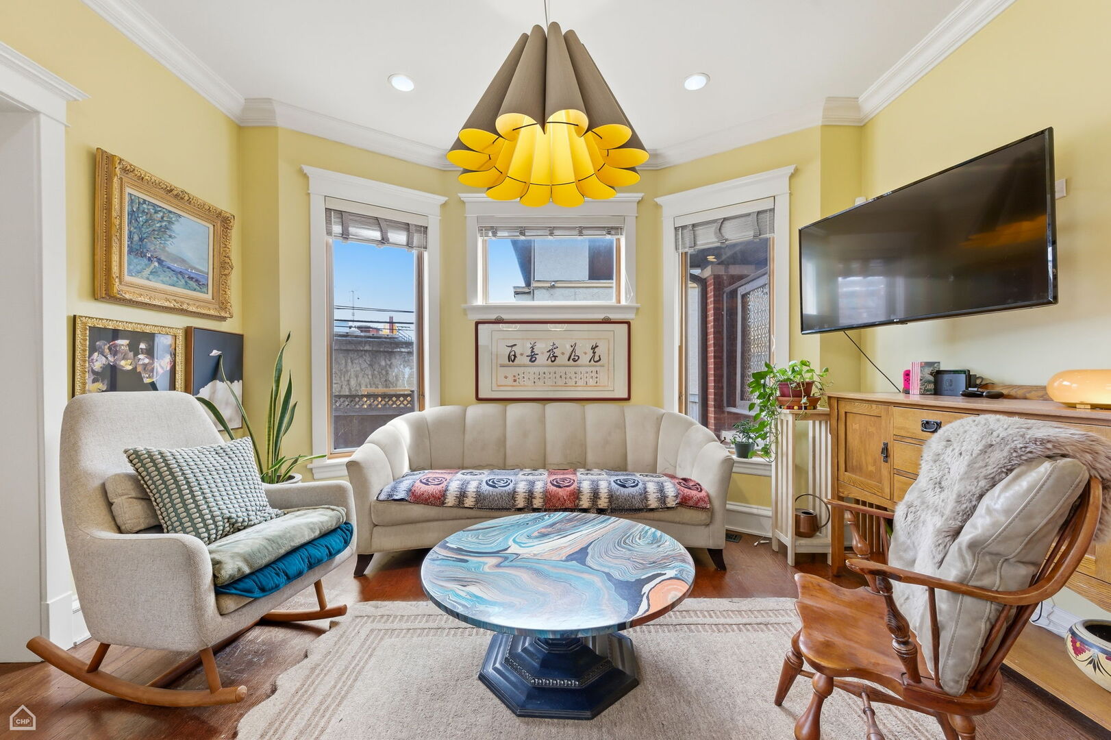 1516 West Sherwin Avenue Chicago, IL 60626 - Photo 17 of 45 a living room with furniture and a flat screen tv