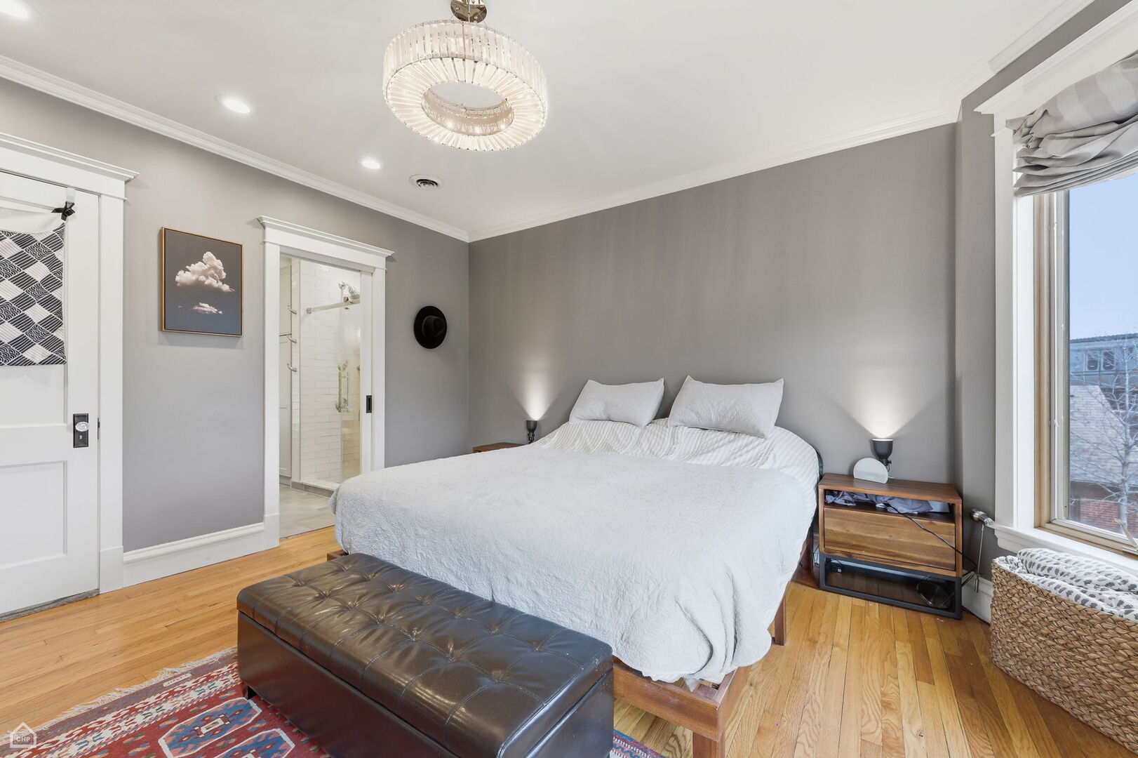 1516 West Sherwin Avenue Chicago, IL 60626 - Photo 21 of 45 a bedroom with a bed and wooden floor