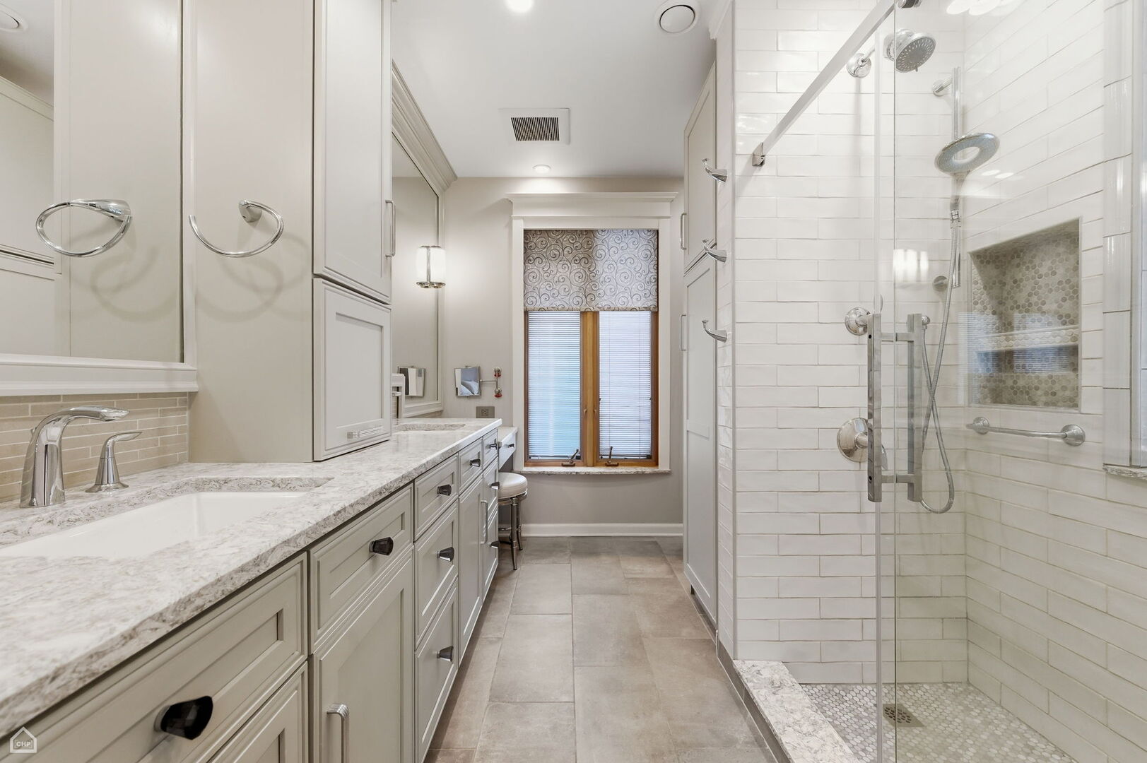 1516 West Sherwin Avenue Chicago, IL 60626 - Photo 23 of 45 a bathroom with a granite countertop sink a toilet and shower