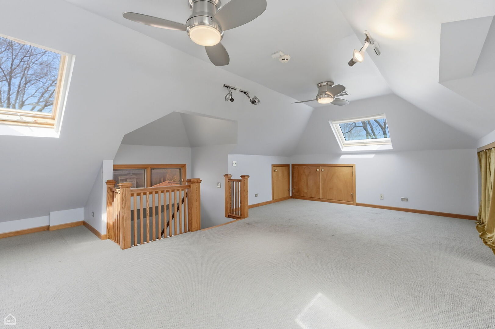 1516 West Sherwin Avenue Chicago, IL 60626 - Photo 30 of 45 an empty room with windows and ceiling fan