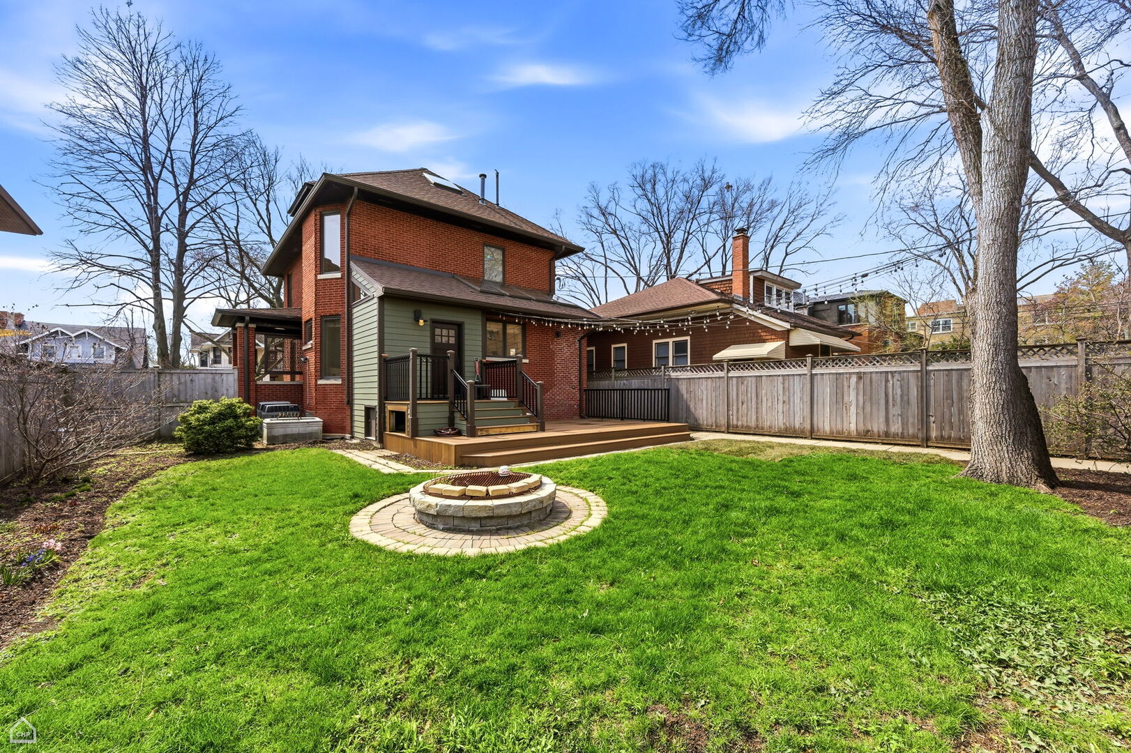 1516 West Sherwin Avenue Chicago, IL 60626 - Photo 39 of 45 a view of a house with backyard and sitting area