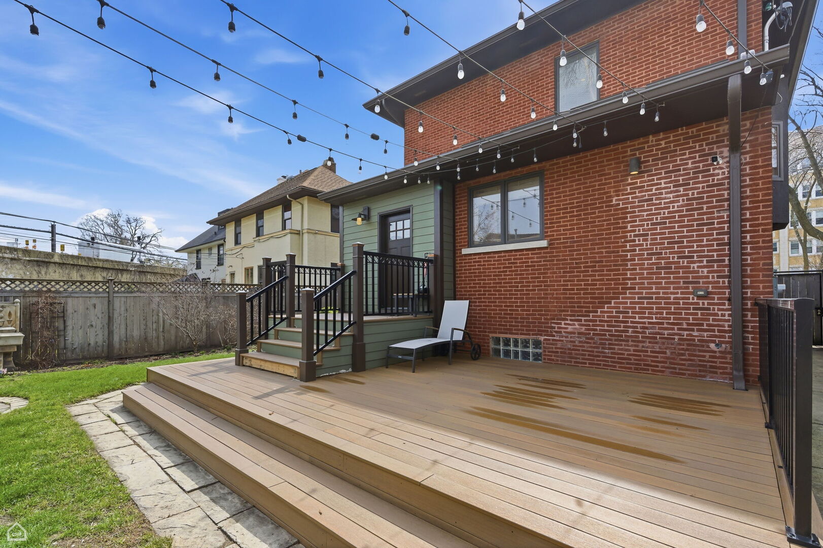 1516 West Sherwin Avenue Chicago, IL 60626 - Photo 40 of 45 a view of a backyard with a sitting area