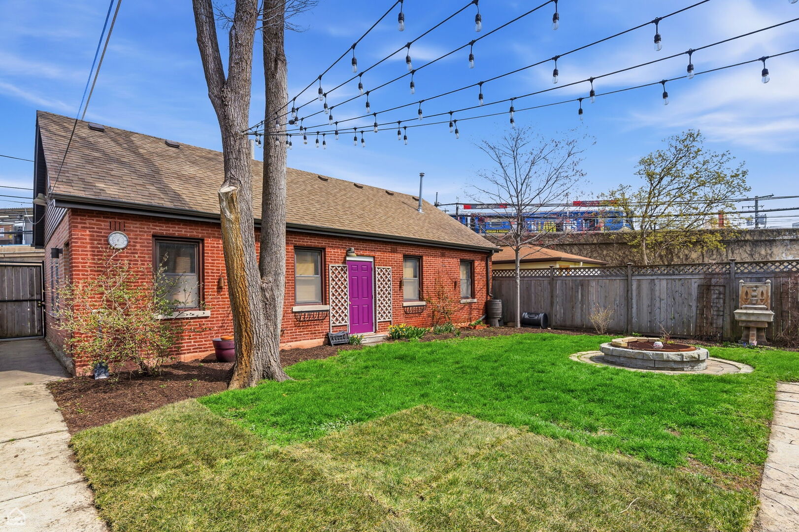 1516 West Sherwin Avenue Chicago, IL 60626 - Photo 41 of 45 a front view of a house with a yard